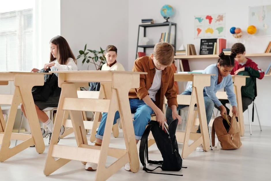 Teen students organizing backpacks in a bright classroom setting. - learning school students - Early childhood education