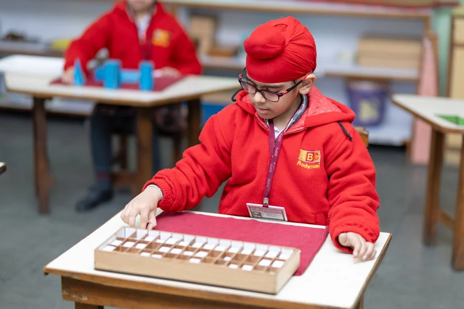 A child focused on educational activity in a Montessori classroom. Bright learning environment. - learning school students - Early childhood education