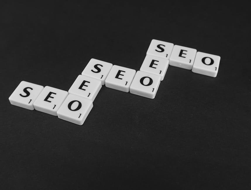 SEO spelled with Scrabble tiles on a black surface, representing search engine optimization concepts. - search engine optimization - Google SEO