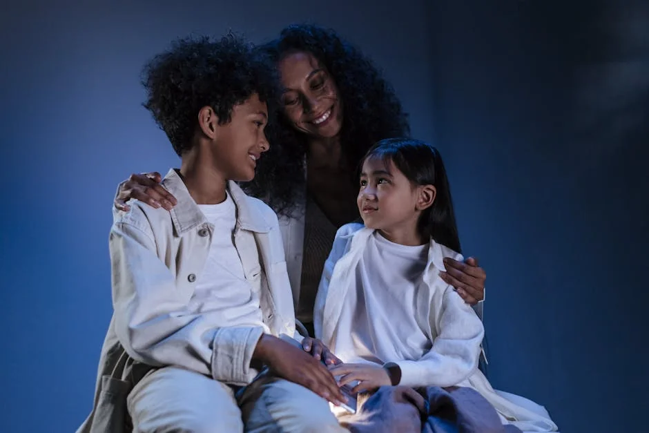 A warm scene of a mother embracing her two children with love and care. - family children care - Parenting tips